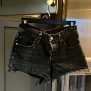 Black Denim Cutoff Shorts made by Levi’s 
Size 24